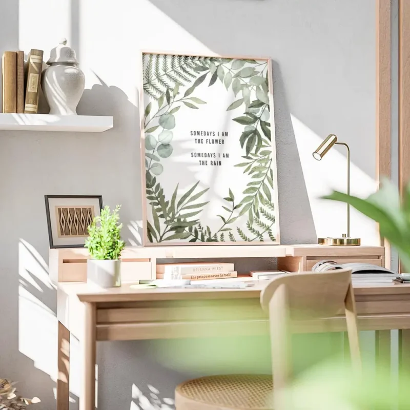 affiche avec des feuilles et branches vertes claires et foncees entourant la typ bureau.webp