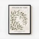 affiche avec des feuilles vertes et blanches superposees sur un fond beige avec avec cadre.webp