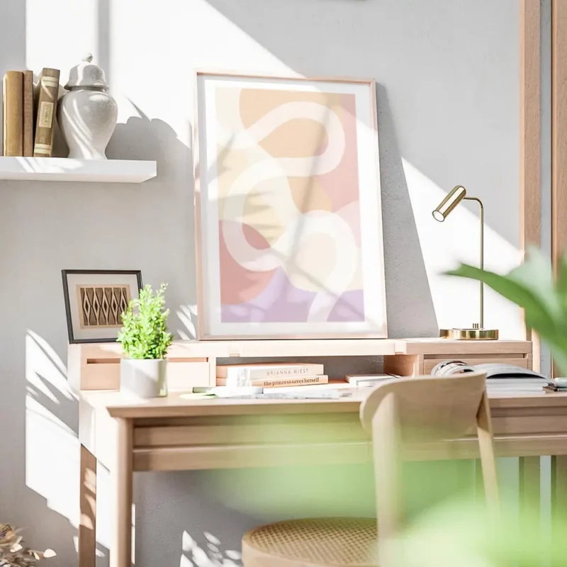 affiche avec des formes abstraites aux couleurs jaune rose orange et violet trav bureau.webp