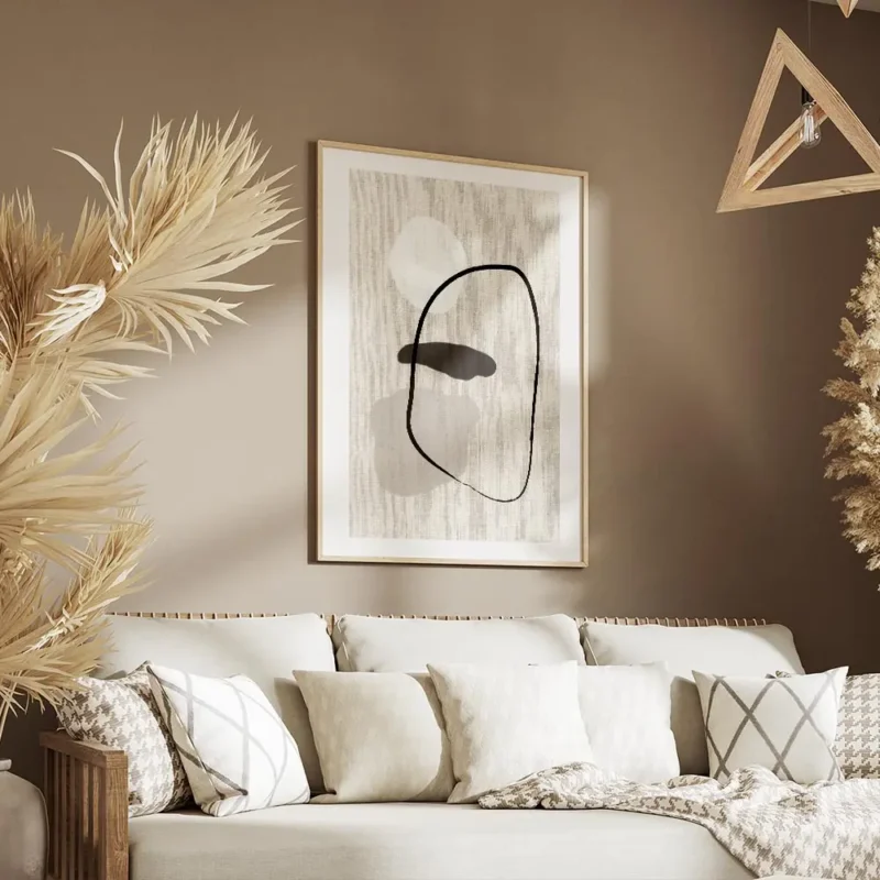 affiche avec des formes abstraites blanches beiges et noires sur un fond en lin salon.webp