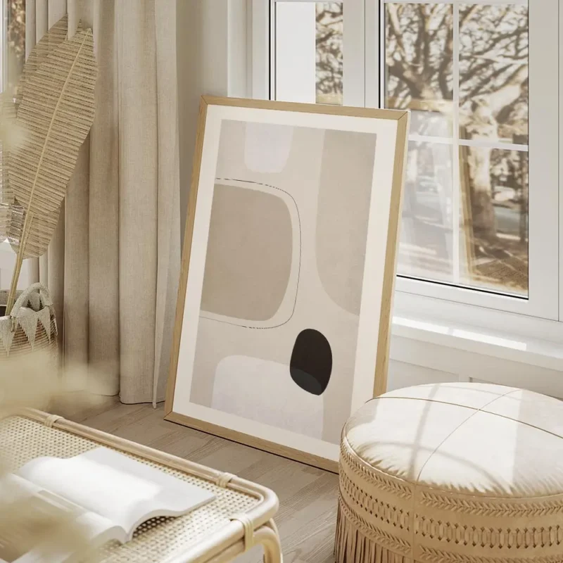affiche avec des formes abstraites en gris clair beige et noir sur fond beige te salon beige.webp
