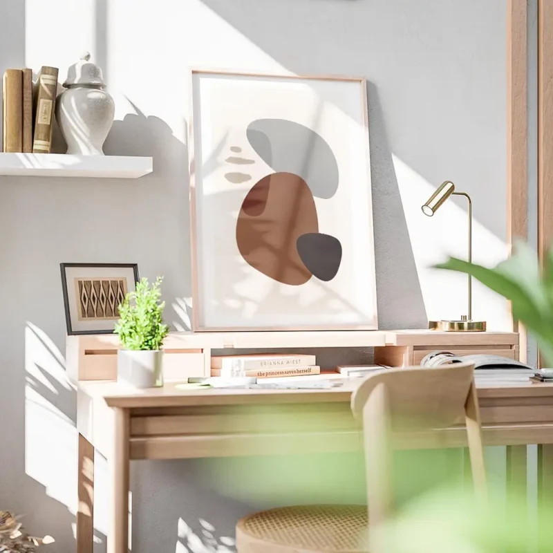 affiche avec des formes abstraites marron grises et noires sur un fond clair tex bureau.webp