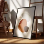 affiche avec des formes abstraites marron grises et noires sur un fond clair tex encadre.webp