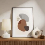 affiche avec des formes abstraites marron grises et noires sur un fond clair tex meuble.webp