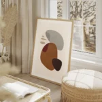 affiche avec des formes abstraites marron grises et noires sur un fond clair tex salon beige.webp