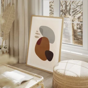 affiche avec des formes abstraites marron grises et noires sur un fond clair tex salon beige.webp