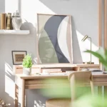affiche avec des formes geometriques allongees aux couleurs sobres bleu vert ros bureau.webp