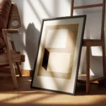 affiche avec des formes geometriques beige marron fonce et terracotta sur un fon encadre.webp