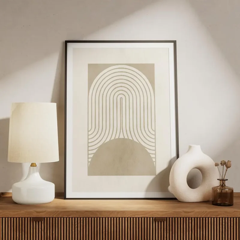 affiche avec des formes geometriques beiges des lignes courbes et un demi cercle meuble.webp