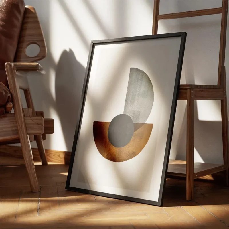 affiche avec des formes geometriques noires marron et grises sur fond beige text encadre.webp