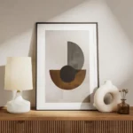 affiche avec des formes geometriques noires marron et grises sur fond beige text meuble.webp