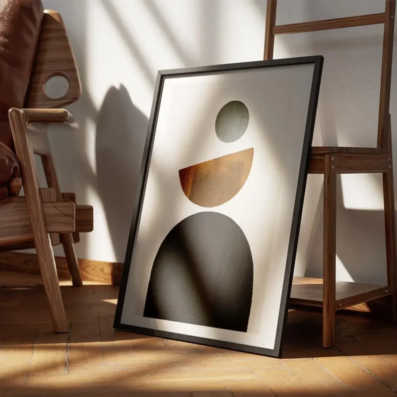 affiche avec des formes geometriques noires marron et grises sur un fond beige i encadre.webp