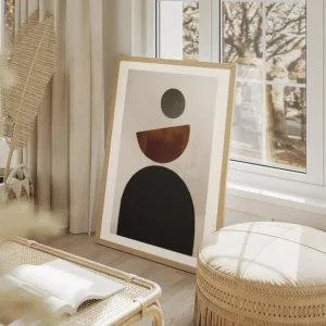 affiche avec des formes geometriques noires marron et grises sur un fond beige i salon beige.webp