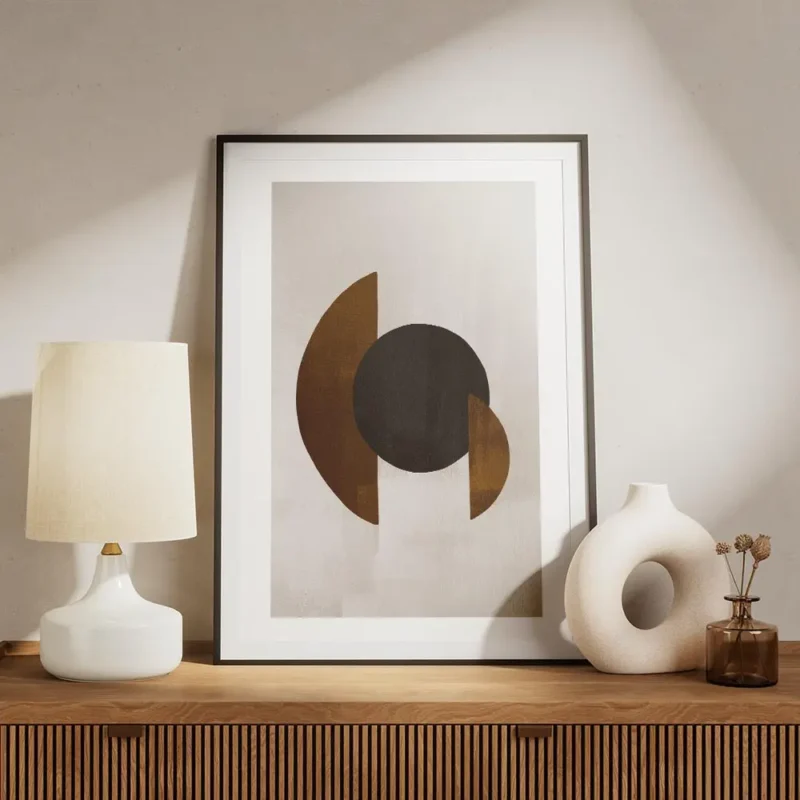 affiche avec des formes geometriques un cercle noir et des demi cercles marron s meuble.webp