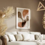 affiche avec des formes organiques abstraites superposees de couleur marron et o salon.webp