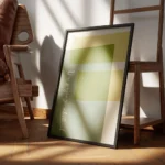 affiche avec des formes rectangulaires et courbes aux couleurs vert sauge jaune encadre.webp