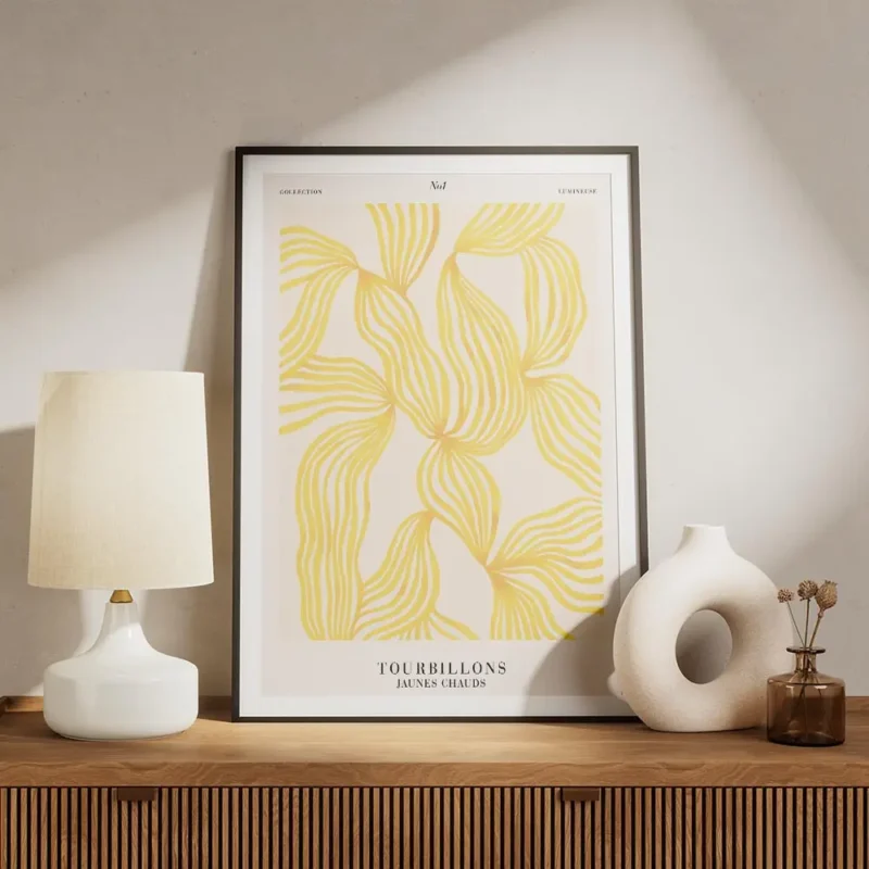 affiche avec des formes tourbillonnantes jaunes sur fond blanc et texte noir sty meuble.webp