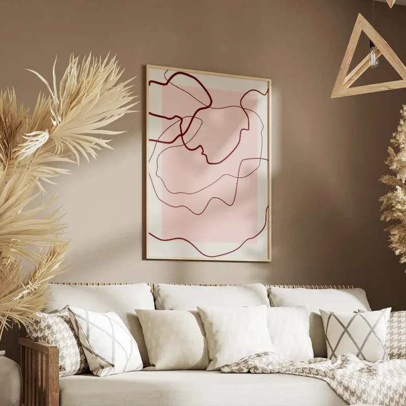 affiche avec des lignes abstraites rouges sur un fond rose clair et beige creant salon.webp