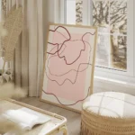 affiche avec des lignes abstraites rouges sur un fond rose clair et beige creant salon beige.webp