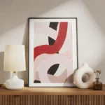 affiche avec des lignes epaisses abstraites rouges roses et noires entrelacees s meuble.webp