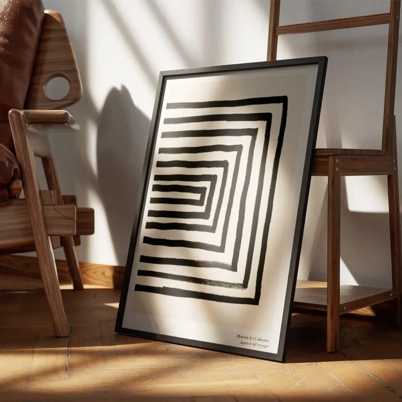 affiche avec des lignes noires formant un rectangle decentre sur un fond beige g encadre.webp