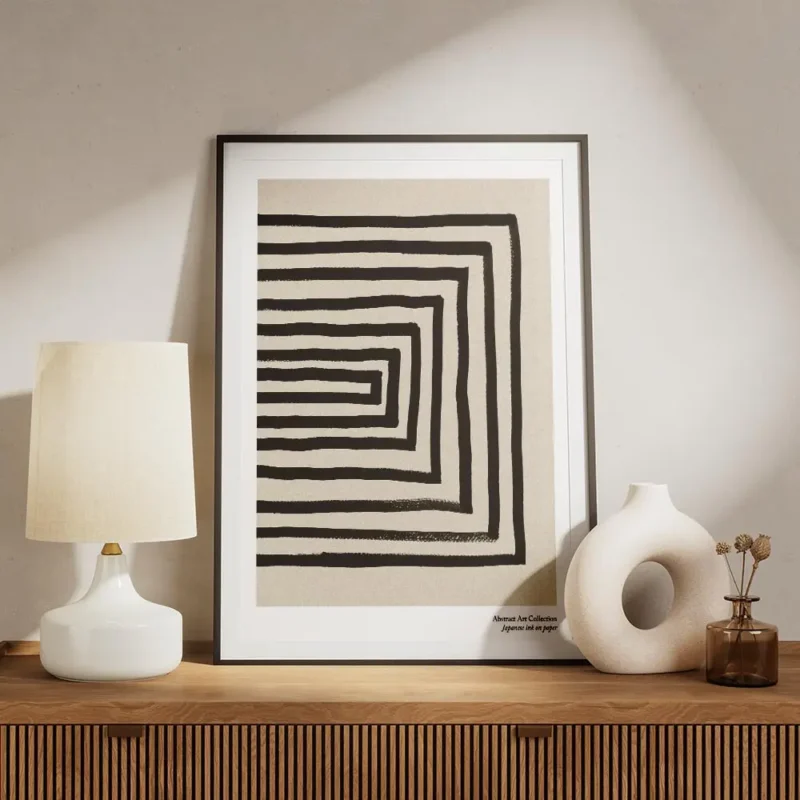 affiche avec des lignes noires formant un rectangle decentre sur un fond beige g meuble.webp