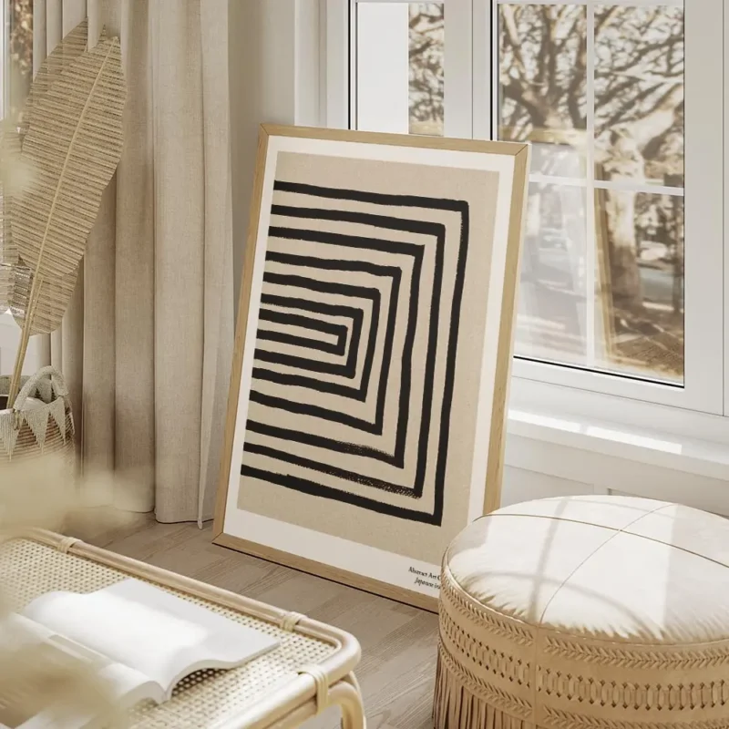 affiche avec des lignes noires formant un rectangle decentre sur un fond beige g salon beige.webp