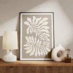 affiche avec des plantes graphiques beiges presentant des feuilles blanches styl meuble.webp