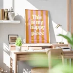 affiche avec des rayures verticales roses et oranges et le texte this is my happ bureau.webp