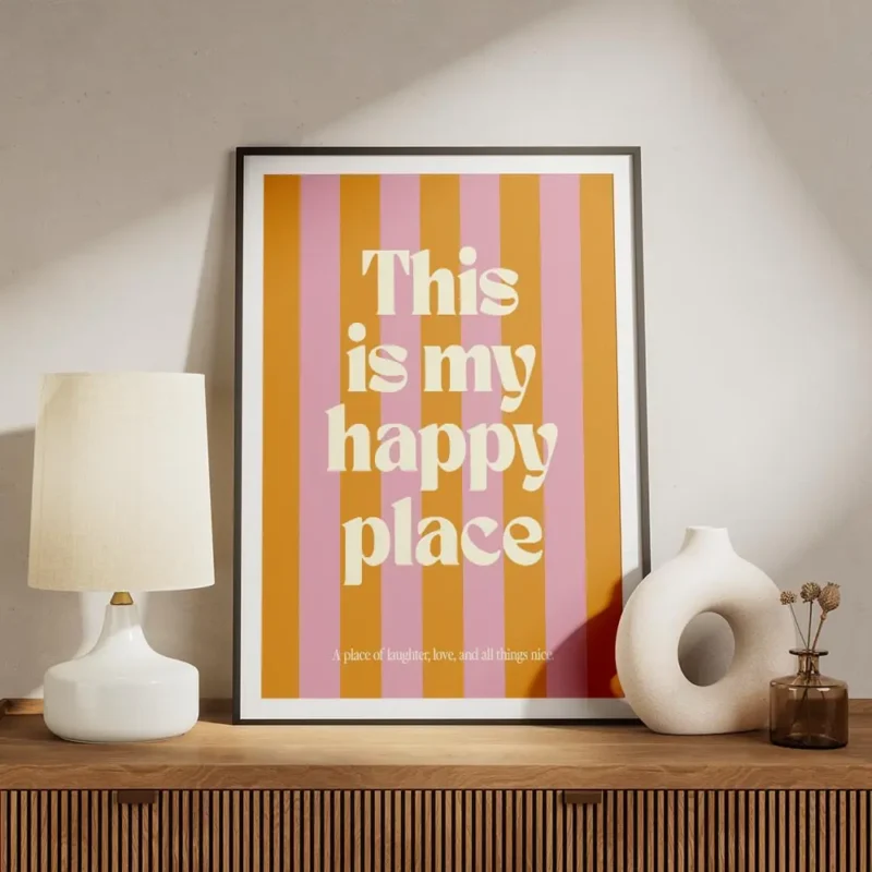 affiche avec des rayures verticales roses et oranges et le texte this is my happ meuble.webp