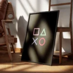 affiche avec des symboles de console de jeu carre rose triangle vert croix bleue encadre.webp