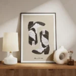 affiche avec deux bottes de cowboy noires et blanches sur fond beige et le texte meuble.webp