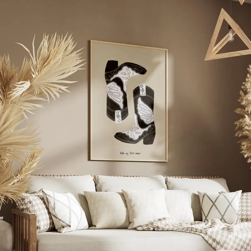 affiche avec deux bottes de cowboy noires et blanches sur fond beige et le texte salon.webp