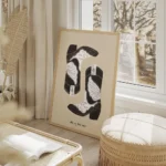 affiche avec deux bottes de cowboy noires et blanches sur fond beige et le texte salon beige.webp