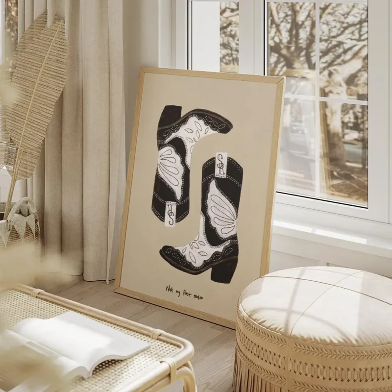 affiche avec deux bottes de cowboy noires et blanches sur fond beige et le texte salon beige.webp