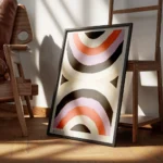 affiche avec deux demi cercles de couleurs beige marron orange violet et noir de encadre.webp