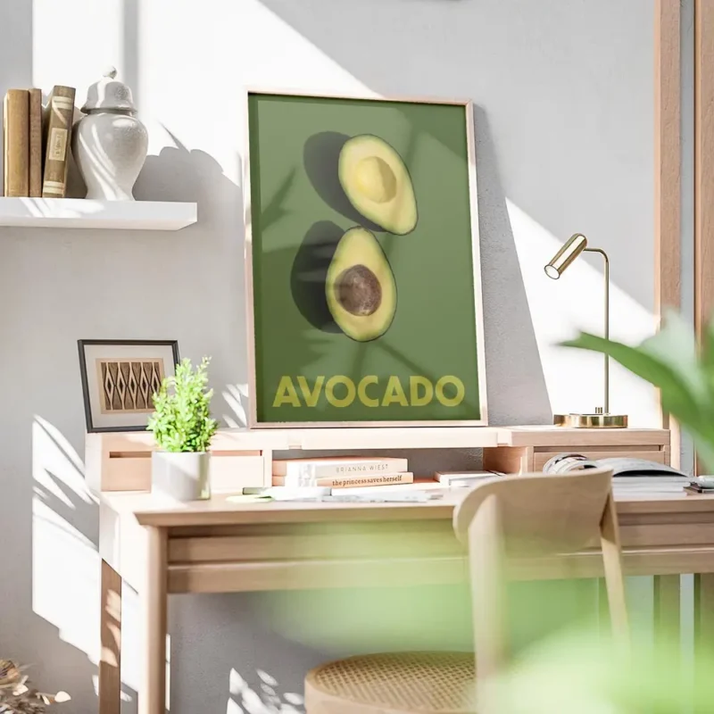 affiche avec deux moities davocat sur un fond vert fonce le texte avocado en bas bureau.webp