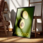 affiche avec deux moities davocat sur un fond vert fonce le texte avocado en bas encadre.webp