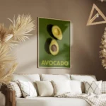 affiche avec deux moities davocat sur un fond vert fonce le texte avocado en bas salon.webp