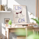 affiche avec deux verres de vin rouge qui trinquent et le texte cin cin en typog bureau.webp