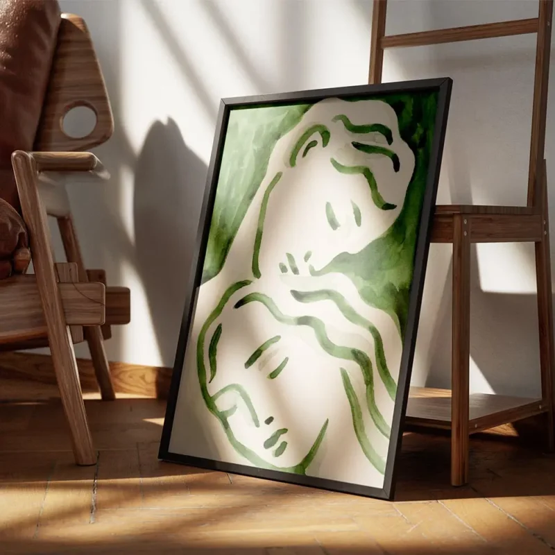 affiche avec deux visages stylises en vert fonce et clair evoquant lamour sur un encadre.webp