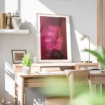 affiche avec enseigne au neon rose fonce this must be the place sur fond sombre bureau.webp