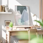 affiche avec formes abstraites aux couleurs pastel bleu vert et rose sur fond cl bureau.webp