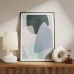 affiche avec formes abstraites aux couleurs pastel bleu vert et rose sur fond cl meuble.webp