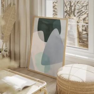 affiche avec formes abstraites aux couleurs pastel bleu vert et rose sur fond cl salon beige.webp