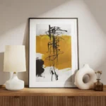 affiche avec formes abstraites en noir et jaune sur fond gris clair texture de t meuble.webp