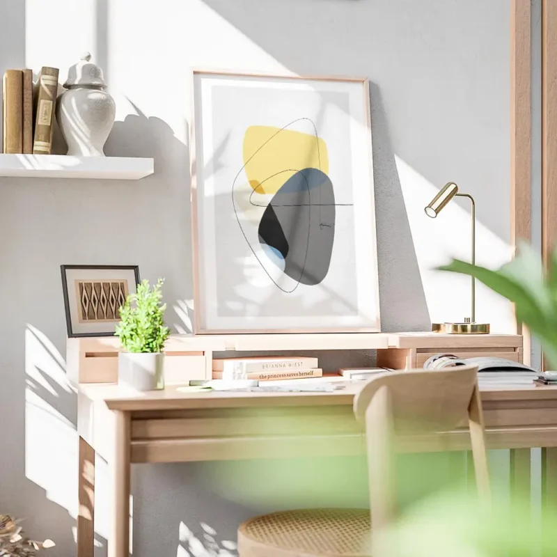affiche avec formes abstraites jaunes et grises tourbillon noir et lignes fines bureau.webp