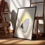 affiche avec formes abstraites jaunes et grises tourbillon noir et lignes fines encadre.webp