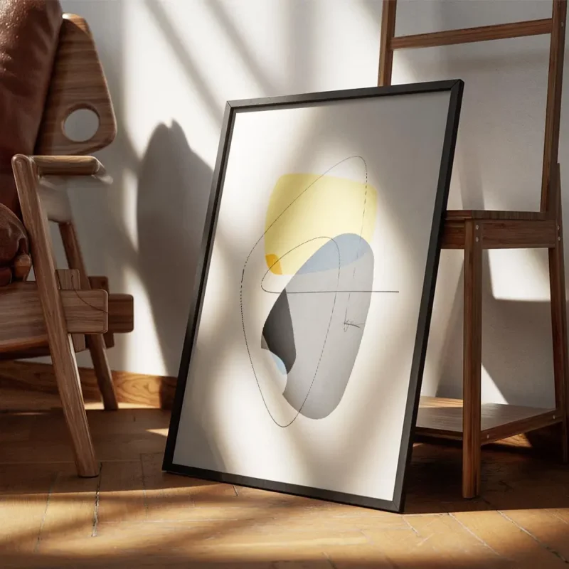 affiche avec formes abstraites jaunes et grises tourbillon noir et lignes fines encadre.webp