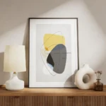affiche avec formes abstraites jaunes et grises tourbillon noir et lignes fines meuble.webp
